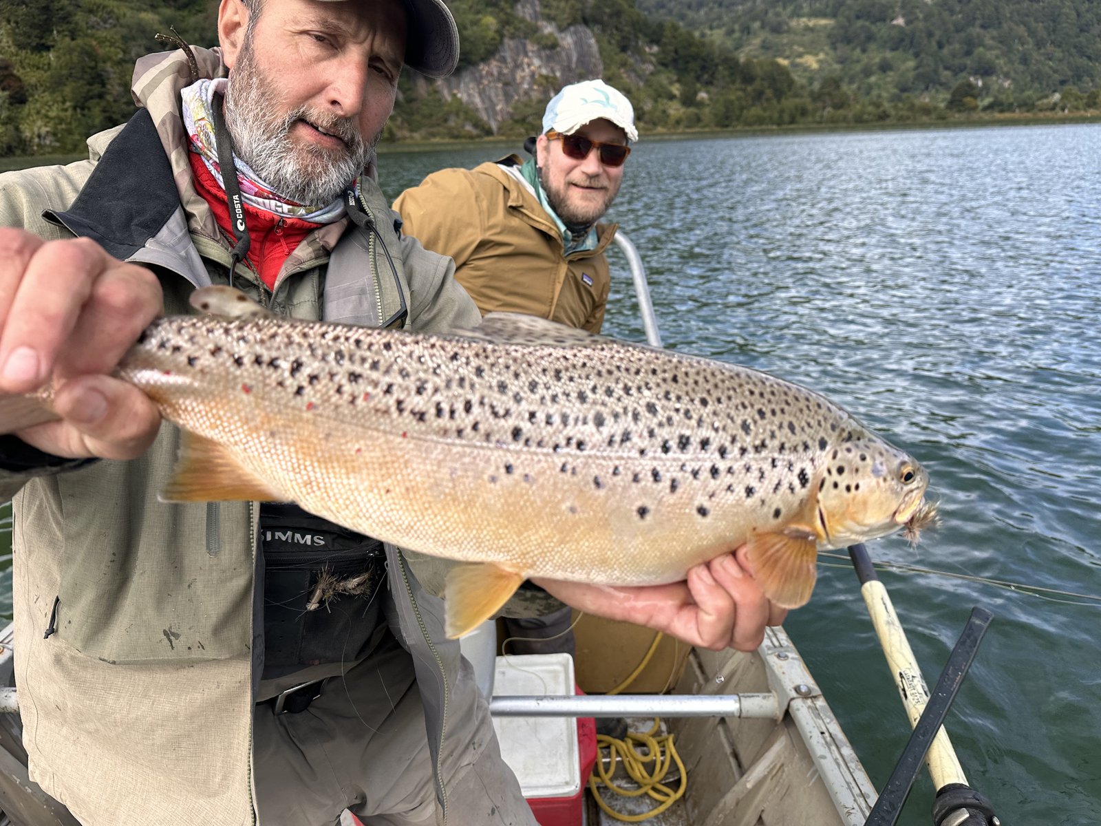 José Marti with a brown trout on home water at Lago Atravesado, Coyhaique