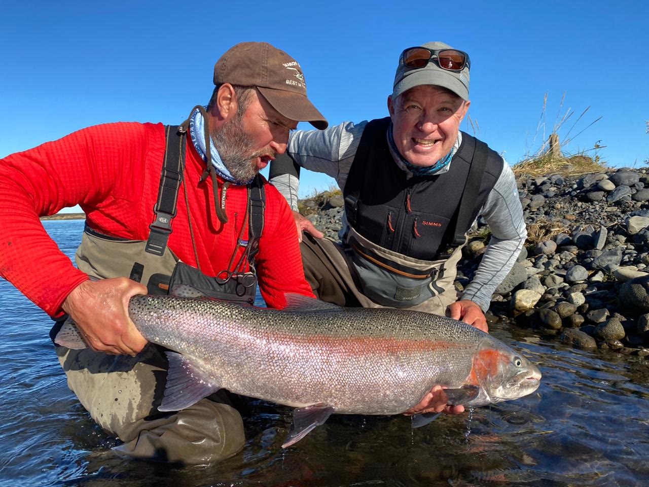 José Marti with a rainbow trout on the Sandy River in Alaska